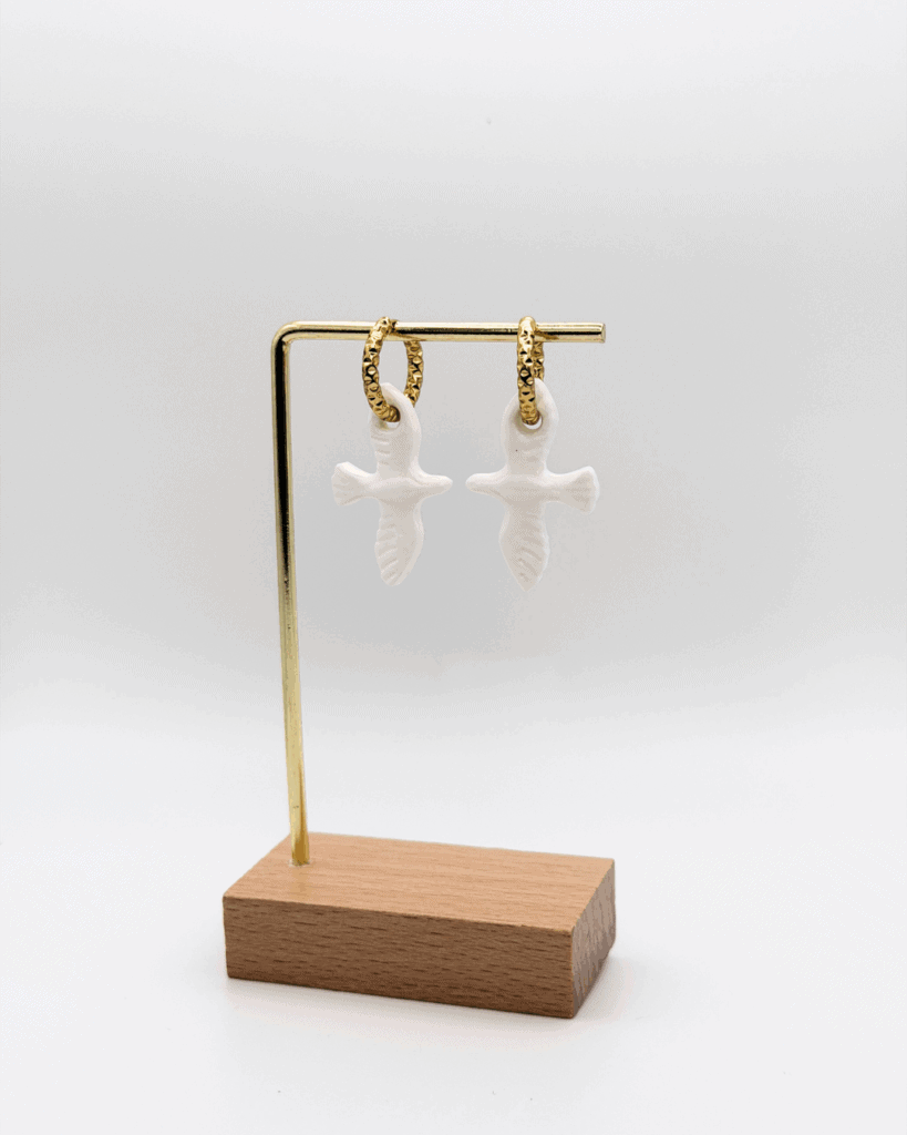 hello so boucle d oreille oiseau blanc martele