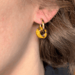 helloso porte pampille donuts oeil tigre lisse