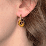 helloso porte pampille donuts oeil tigre martele