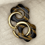 helloso tissus pampille fleur oeil tigre lisse