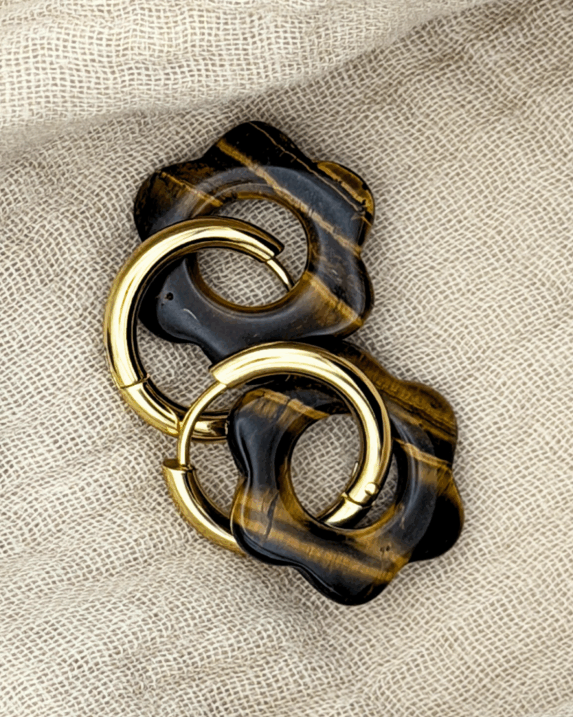 helloso tissus pampille fleur oeil tigre lisse