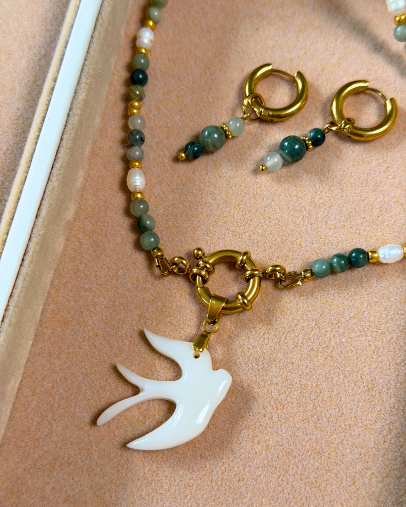 parure hirondelle perles fines