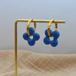 boucle d oreilles fleur de waide dore creoles martelees