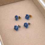 boucle d oreilles fleur de waide puce or argent